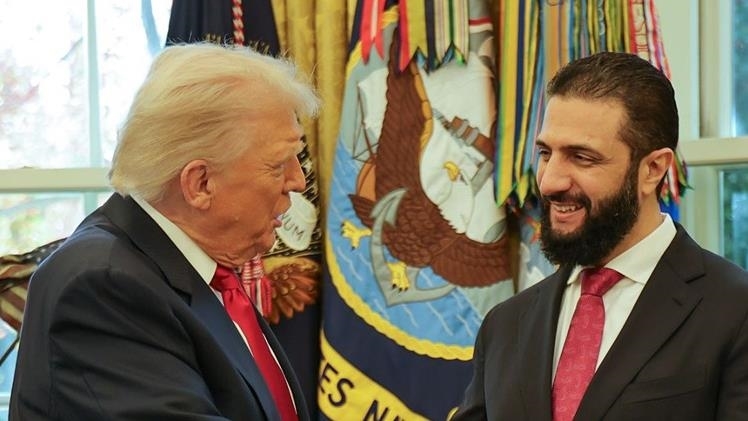 Трамп и временный президент Сирии Аш-Шараа 